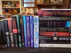 Even More Stacks of Books...more in the background, as well as a cat